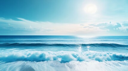 Fototapeta premium Ocean Waves Crashing on Shore with Bright Sun and Blue Sky