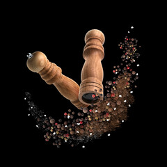 Salt and pepper mills in air on black background