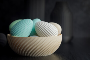 Easter decoration. Colorful eggs in bowl on black background.