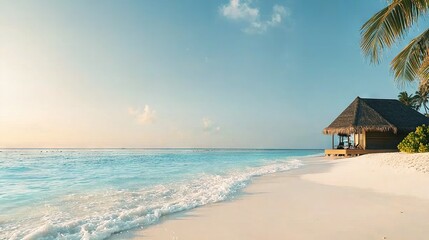 Fototapeta premium A palm-covered hut sits atop a sandy beach, adjacent to the ocean and another hut with a thatched roof