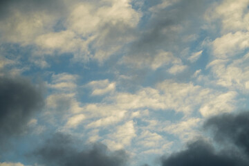 Fototapeta premium A panoramic view of the sky filled with voluminous clouds evokes a sense of endless space. Symbolizes infinite possibilities.