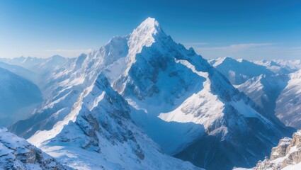 The panoramic mountain view of alpine snow-capped peaks in a winter mountain backdrop.