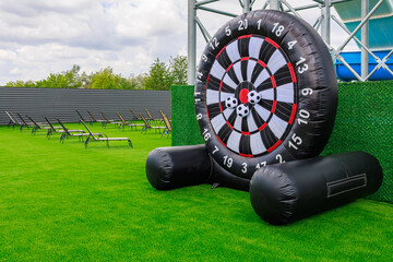 A large inflatable target with a black