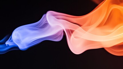 Fototapeta premium Abstract flowing smoke in vibrant color creating a dynamic visual effect against a dark background