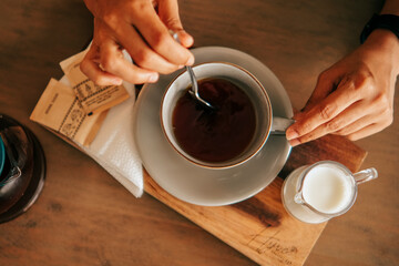 cup of coffee and hand