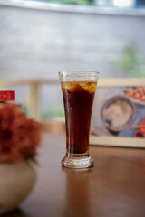 glass of cola with ice