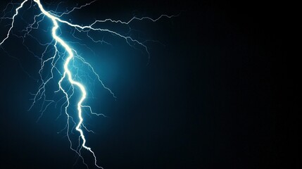   A close-up of a lightning bolt on a black background, with a dark sky in the background and a lightning bolt in the center of the image