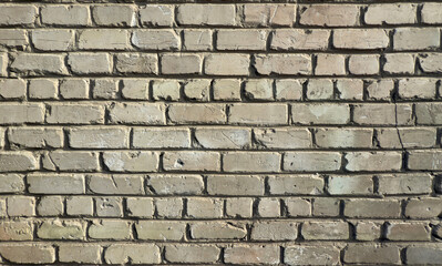 Wall of bricks and cement texture background, front view