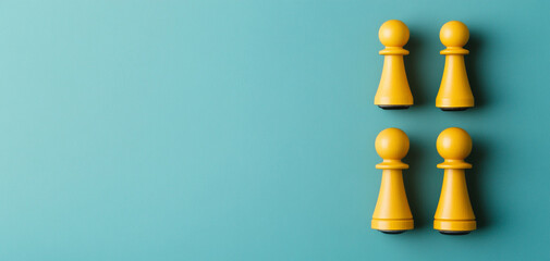 Startup entrepreneur concept. Yellow chess pieces on a blue background.