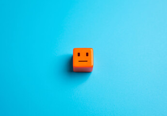 An orange cube with an amorphous, emotionless face. Apathy and indifference. The concept of the...