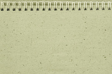 Recycled paper notebook with metal spiral, binding rough texture. Eco-friendly and minimalist...