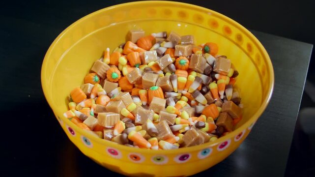 Little Girl Grabbing a Big Handfull of Halloween Candy