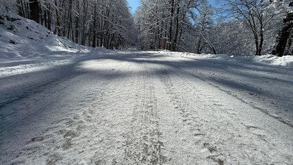 A winding road covered in snow