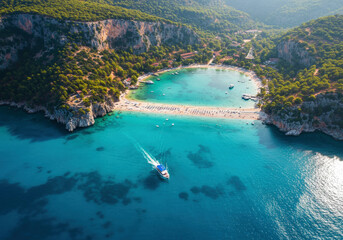Fototapeta premium Oludeniz Blue Lagoon with turquoise sea, paradise white sand beach and tourist boat