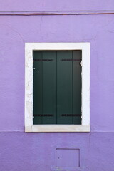 Typical renaissance window in Burano, Italy