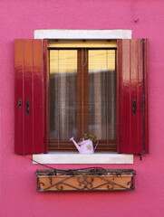 Typical renaissance window in Burano, Italy