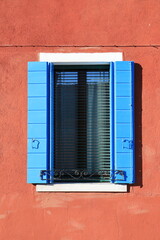 Typical renaissance window in Burano, Italy