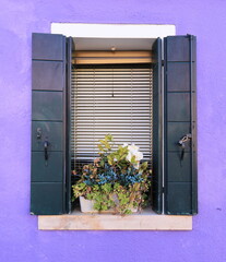 Typical renaissance window in Burano, Italy