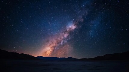 Fototapeta premium Majestic Milky Way Galaxy Over Dark Desert Landscape at Night