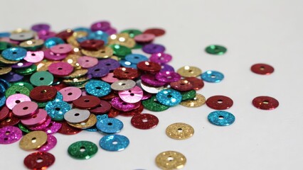 Colorful Sequins on White Background