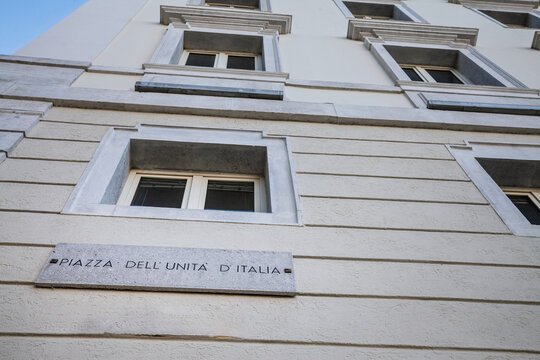Street sign of Piazza dell Unita d Italia (Square of italian UNity), the main square in Trieste, Italy, known as Europe largest seaside square, showcasing Italian architecture and cultural heritage.