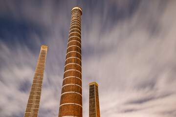 old chimneys with clouds