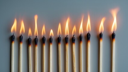 Concept of various stages in human life. Abstract image featuring burning matches.
