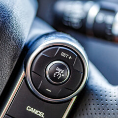 Inside the car.Multimedia leather steering wheel in a modern expensive car.Dashboard, inner...