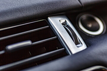 Inside the car.Car ventilation system and air conditioning. Modern car interior details.Detailing.