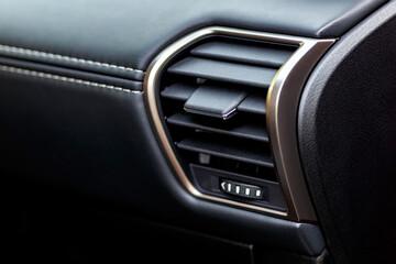 Inside the car.Car ventilation system and air conditioning. Modern car interior details.Detailing.
