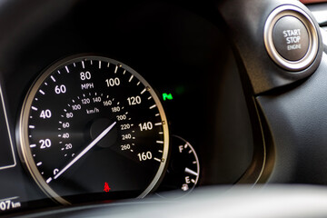 Inside the car.Speedometer and tachometer of the car.Dashboard, inner workings of a car.