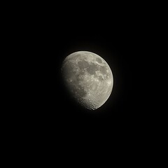 Naklejka premium Crescent Moon in Night Sky