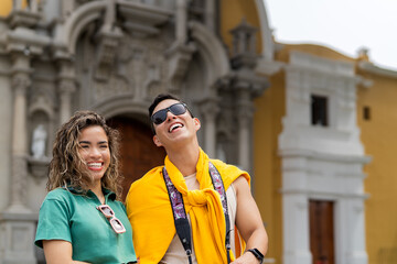Tourists admiring church architecture in latin america