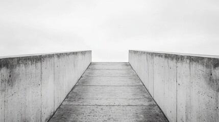 Fototapeta premium A Minimalist Concrete Ramps Ascending to a Cloudy Sky: Architectural Photography