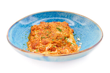 Traditional italian dish lasagna alla bolognese in the blue plate with white background