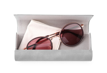 One grey case with sunglasses and lens cloth isolated on white, top view