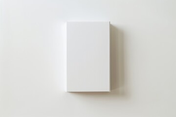 Minimalist white vertical rectangle mockup on a clean white background, front view.