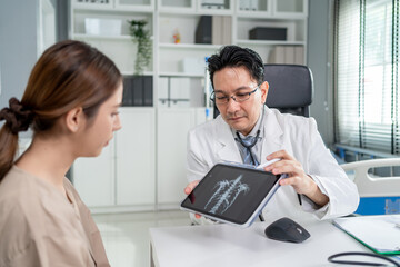 Fototapeta premium Asian young woman visit and consult health problem with doctor in hospital. 