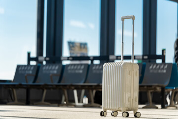 Travel, The suitcases in an empty airport hall, traveler cases in the departure airport terminal waiting for the area, vacation concept, blank space for text message or design