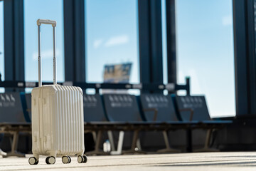 Travel, The suitcases in an empty airport hall, traveler cases in the departure airport terminal waiting for the area, vacation concept, blank space for text message or design
