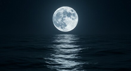 Full moon over tranquil ocean at night.