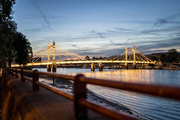 Fototapeta premium London, UK - September 14, 2023: Long Exposure shot of light Albert Bridge at night