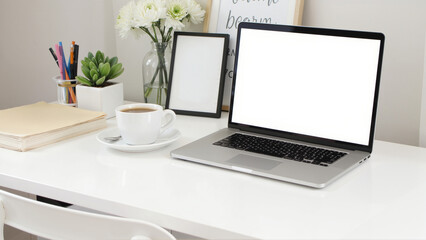 Fototapeta premium Modern workspace with laptop, clean desk setup, minimalistic decor, perfect for productivity and creativity, ample copy space.