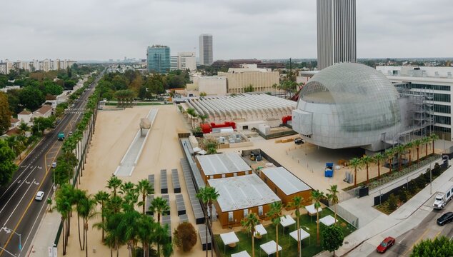 Aerial view of the Academy Museum of Motion Pictures, LACMA, and surrounding buildings. Tourists visit the museum to view movie history.  Los Angeles, California,USA. 9 September 2024