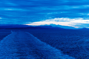 Wave trails left by ship or ferry propellers in the strait of Georgia British Columbia Canada.