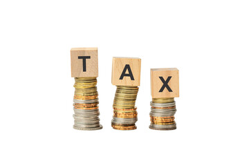 Tax, word on wooden blocks and on top of stacked coins. Isolated on transparent background.