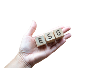 ESG on wooden blocks on top of the palm of hand. Isolated on transparent background.