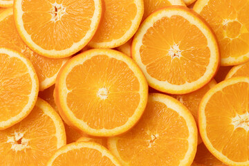 Heap of sliced navel orange for background. Top view 