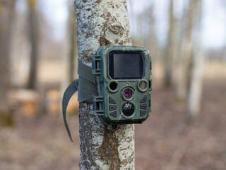 Animal trail surveillance mini camera. Hunting accessories and tools. Nature protection and monitoring. Camera with motion detector	 and night vision
