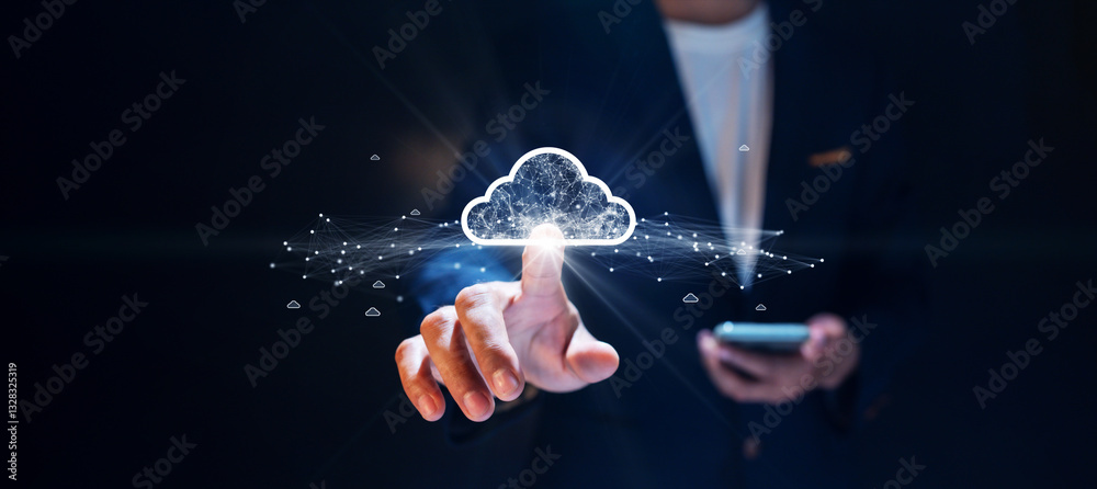 Aufkleber Businessman using smartphone and interacting with glowing digital cloud network, representing cloud computing and data connectivity on dark background.